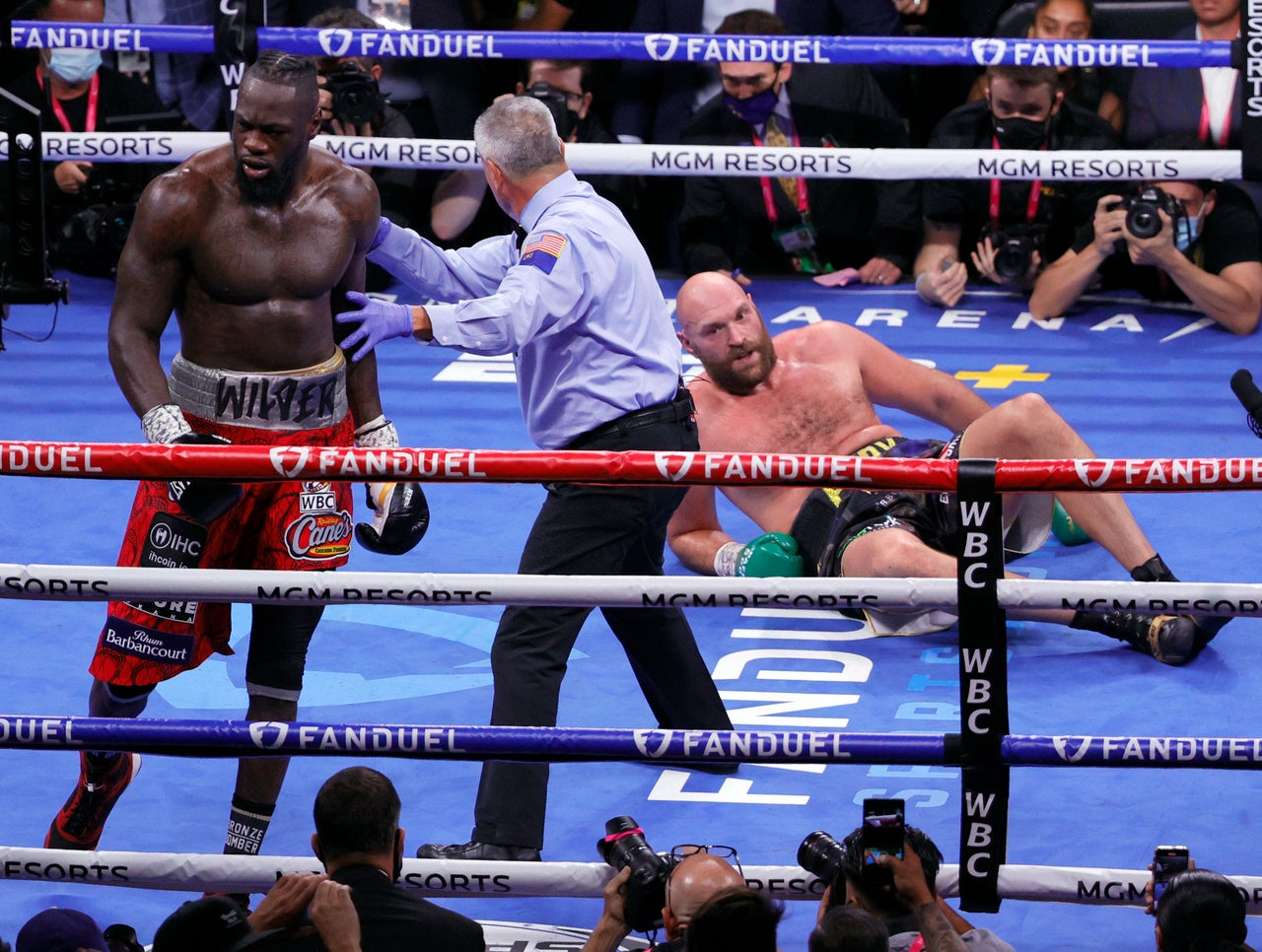 Fury was dropped twice in his third clash with Deontay Wilder – but won in the end (Getty)