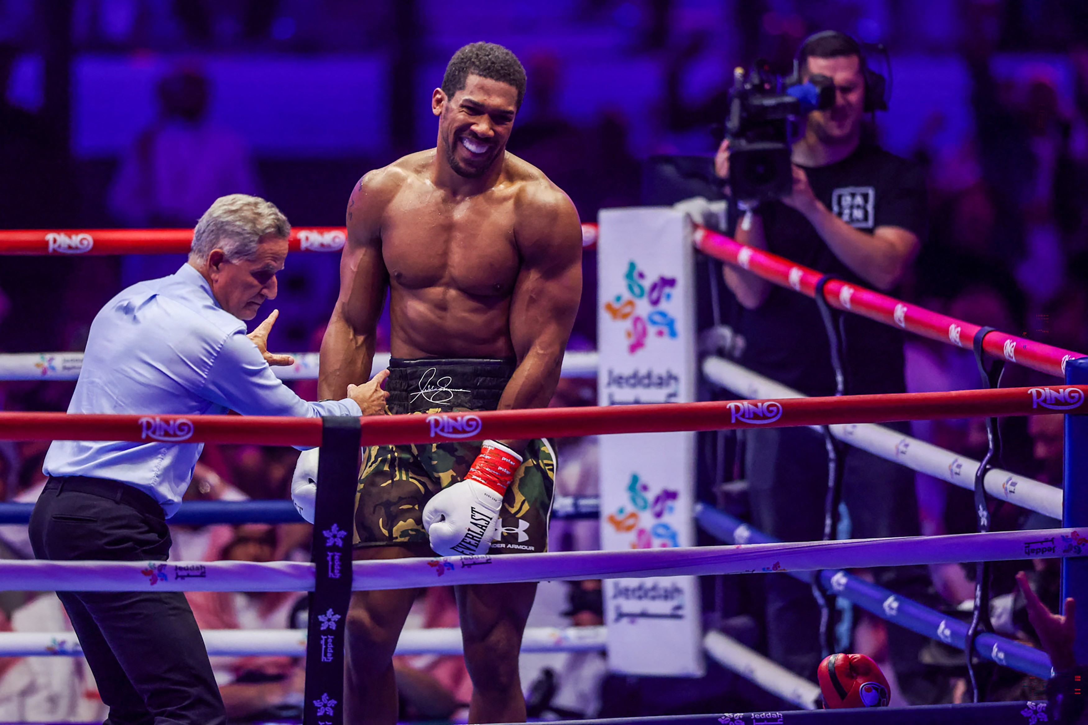 Britain's boxer Anthony Joshua celebrates winning against Albania's boxer Kristian Prenga in their heavyweight boxing fight at the Jeddah Superdome in Jeddah on July 26, 2026. Two-time heavyweight world champion Anthony Joshua survived two early knockdowns on the way to a second-round knockout of Kristian Prenga on July 26, his triumphant ring return paving the way for a blockbuster all-British bout with Tyson Fury. (Photo by AFP via Getty Images)