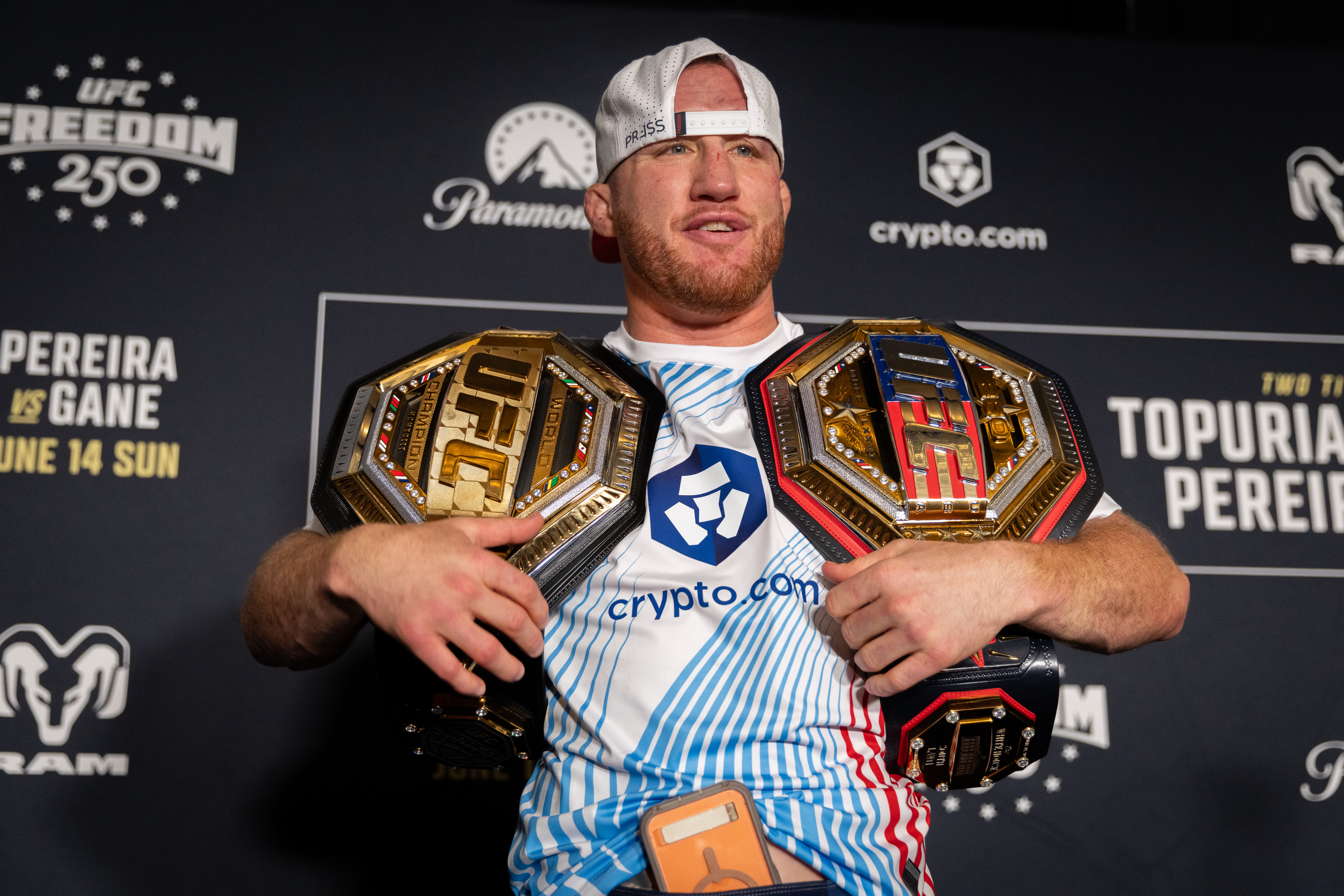 WASHINGTON, DC - JUNE 15: Justin Gaethje holds up his belts following a press conference with other fight winners and Dana White following UFC Freedom 250 at the JW Marriott in Washington, DC on June 15, 2026. (Photo by Nathan Posner/Anadolu via Getty Images)