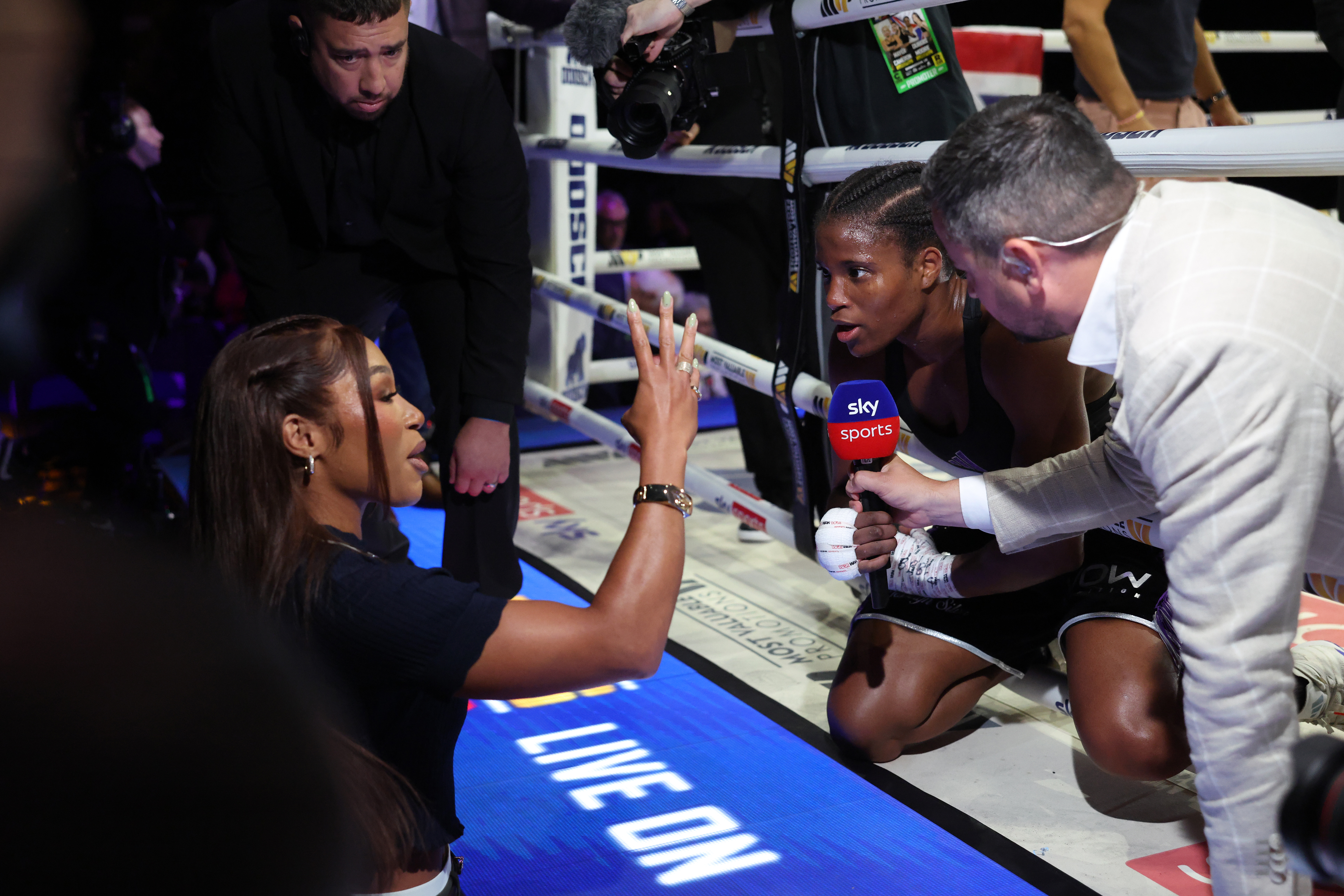 BIRMINGHAM, ENGLAND - AUGUST 29: Caroline Dubois clashes with American boxer Alycia Baumgardner after victory over Amelia Moore in their WBC and WBO World Lightweight title fight on the MVPW-06 UK v USA fight night card at BP Pulse Live on August 29, 2026 in Birmingham, England. (Photo by Matthew Lewis/Getty Images)