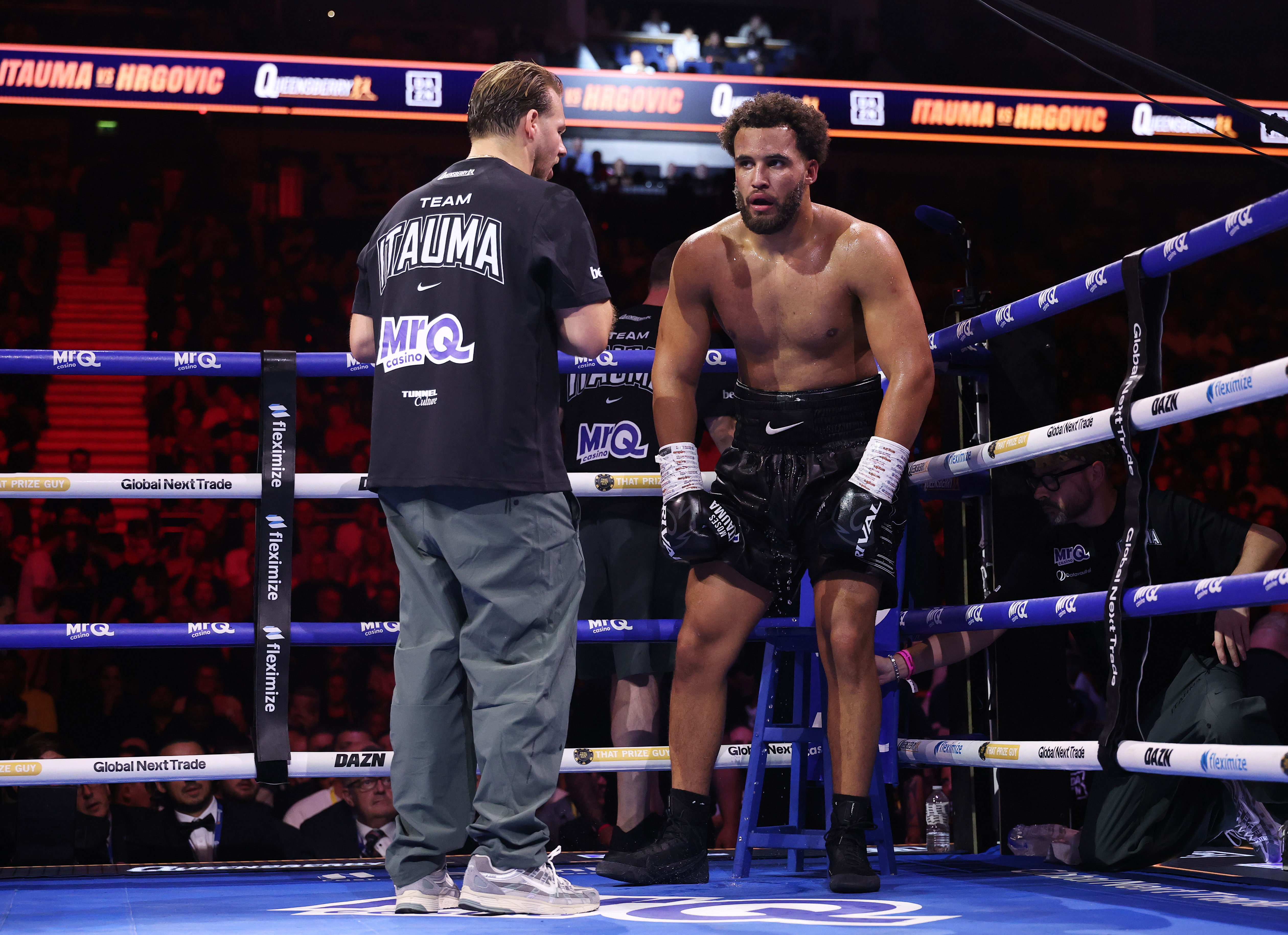 LONDON, ENGLAND - AUGUST 29: Moses Itauma reacts beside trainer Ben Davison after defeat to Filip Hrgovic in their IBF World heavyweight title fight on the Moses Itauma and Filip Hrgovic: Natural Born Thriller fight night card at The O2 Arena on August 29, 2026 in London, England. (Photo by Richard Pelham/Getty Images)