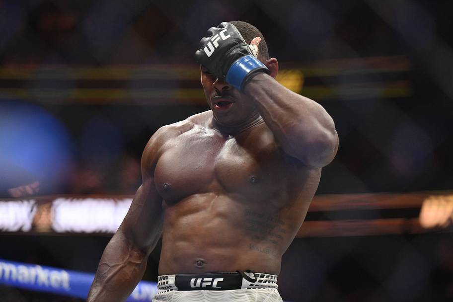 Joaquin Buckley (blue gloves) reacts after being defeated by Sean Brady (red gloves) during UFC 328 at Prudential Center.