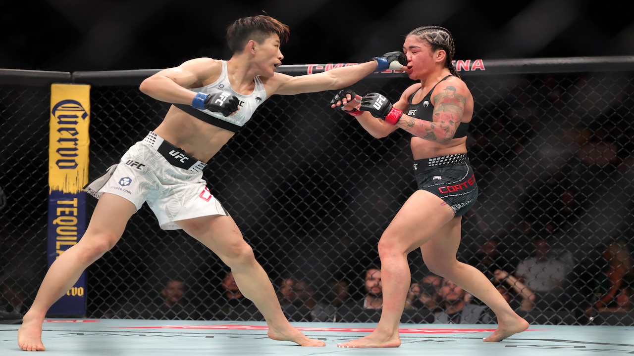 UFC 332: Wang Cong throws a left jab