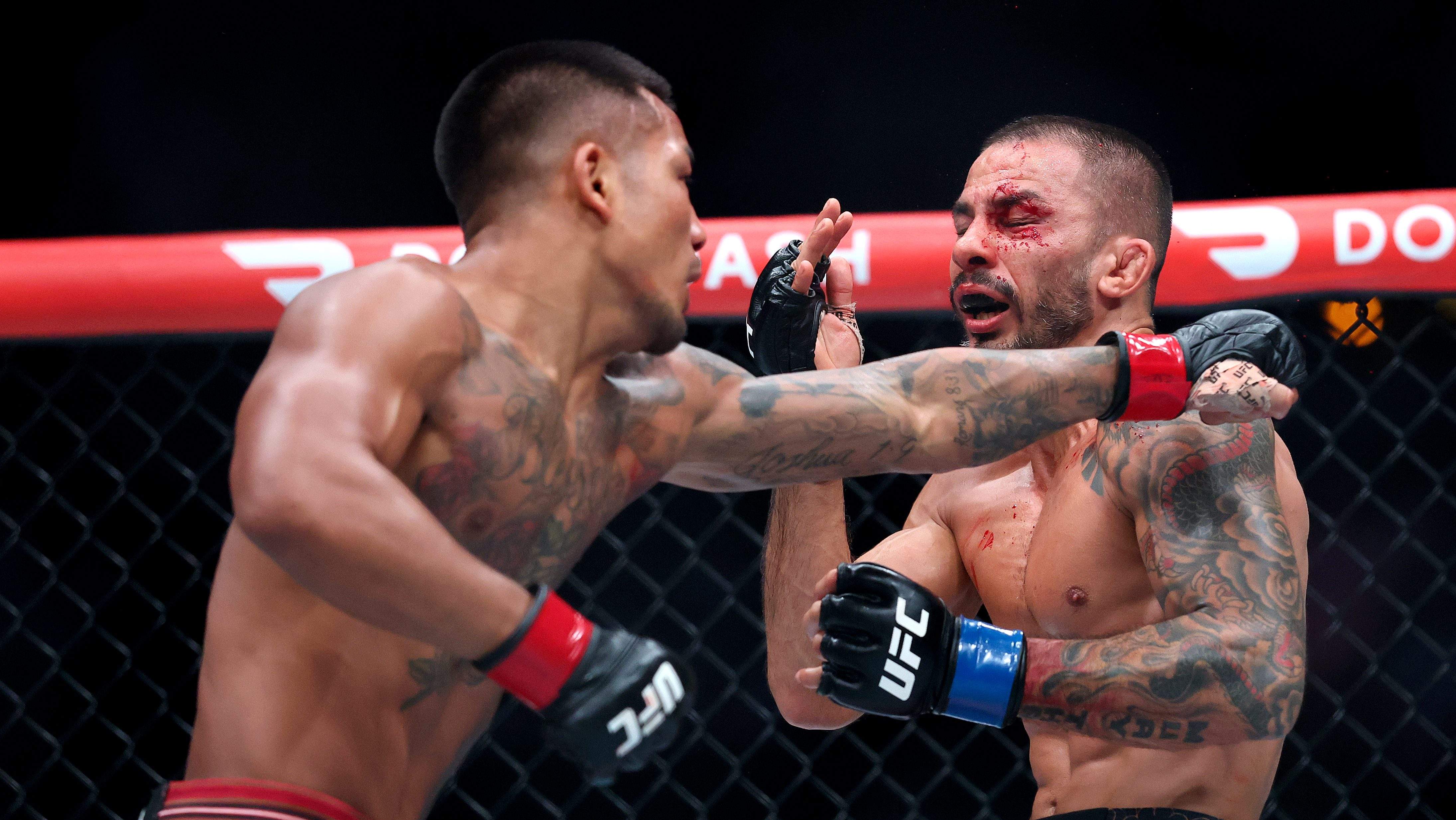 LOS ANGELES, CALIFORNIA - SEPTEMBER 19: Joshua Van (L) of Myanmar punches Alexandre Pantoja of Brazil in their Flyweight Championship bout during UFC 331: Van v Pantoja 2 at Crypto.com Arena on September 19, 2026 in Los Angeles, California. (Photo by Luke Hales/Getty Images)
