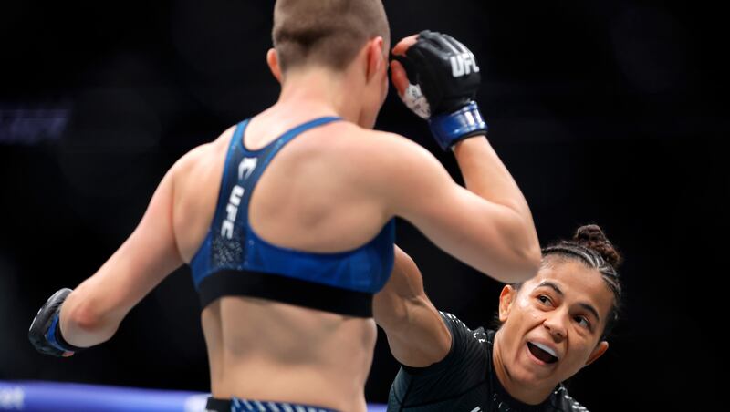 Natalia Silva, right, punches Rose Namajunas in a women's flyweight bout during the UFC 324 mixed martial arts event Saturday Jan. 24, 2026, in Las Vegas.