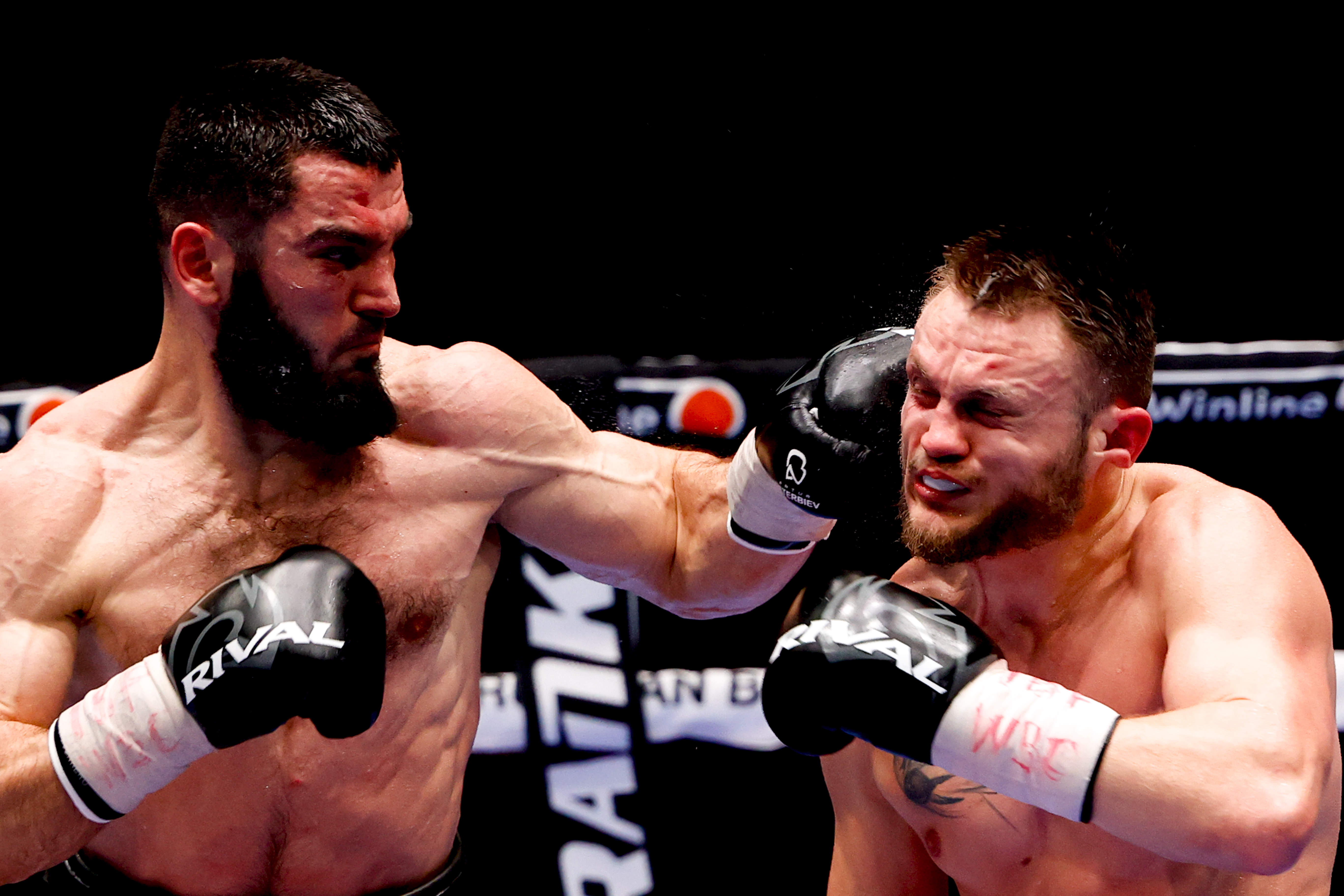 MOSCOW, RUSSIA - MARCH 20: Russian Artur Beterbiev (L) and German Adam Deines (R) fight in their light heavyweight (79.3) bout at a professional boxing event at Megasport Arena, in Moscow, Russia on March 20, 2021. Beterbiev retains his WBC and IBF light-heavyweight titles. (Photo by Sefa Karacan/Anadolu Agency via Getty Images)