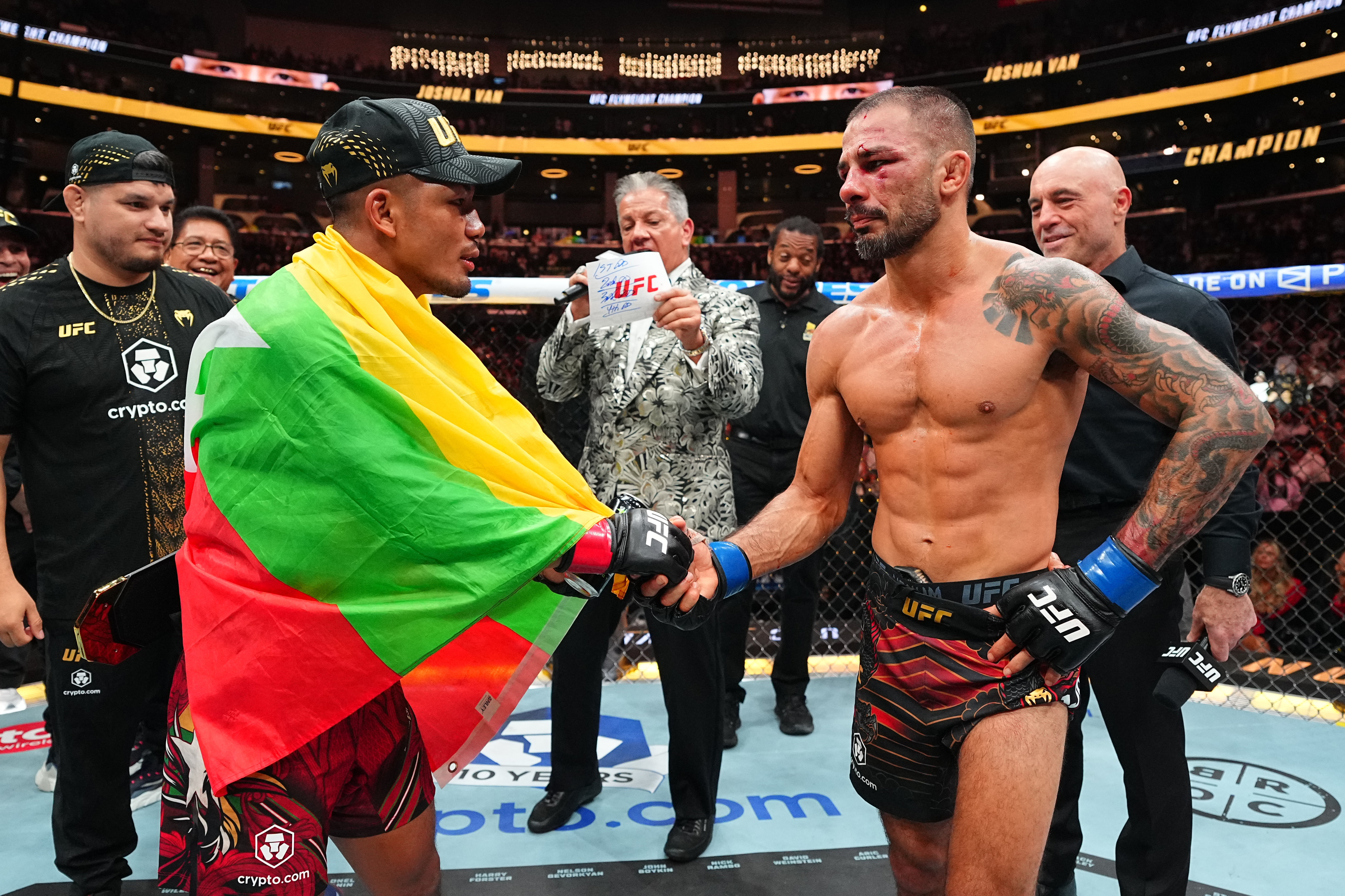 LOS ANGELES, CALIFORNIA - SEPTEMBER 19: (L-R) Joshua Van of Myanmar talks with Alexandre Pantoja of Brazil after the UFC flyweight championship fight during the UFC 331 event at Crypto.com Arena on September 19, 2026 in Los Angeles, California. (Photo by Chris Unger/Zuffa LLC)